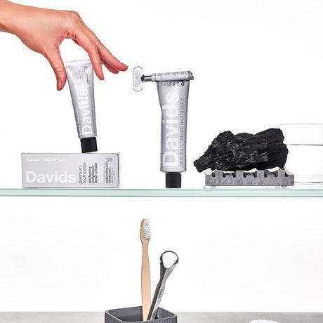 Davids Premium Natural Toothpaste - Charcoal and Peppermint packaging  display
